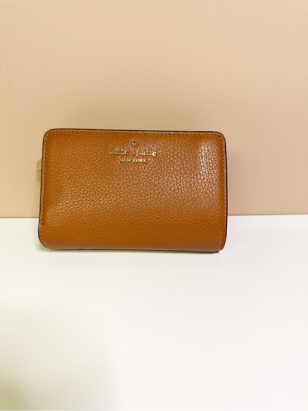 Kate Spade Pebbled Leather Bifold Wallet - Cognac
